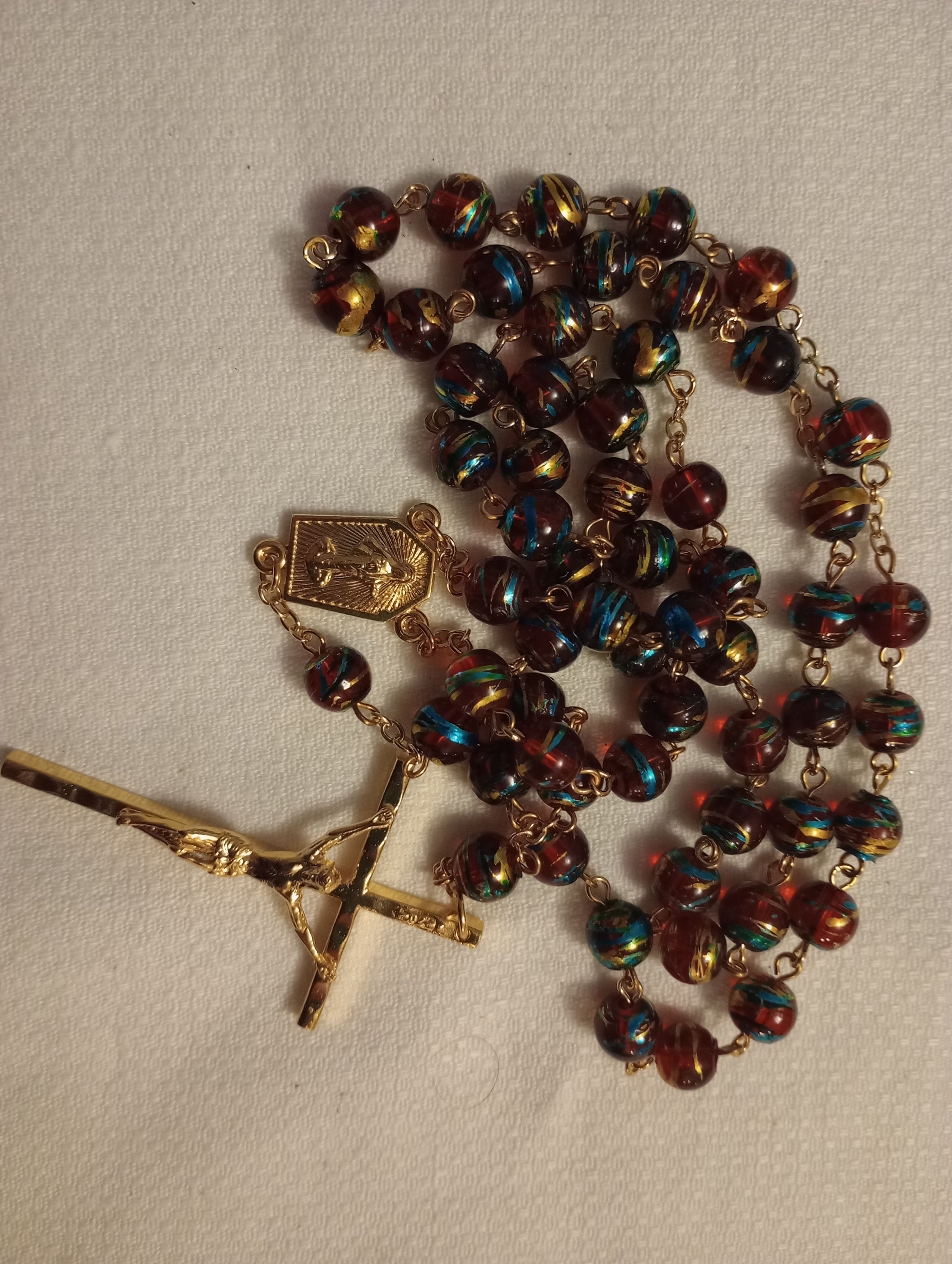 Red Swirl Goldtone Rosary