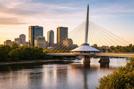 Winnipeg skyline and Esplanade Riel bridge spanning the Red River.