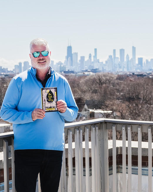 The author Ron Stempkowski with the Chicago skyline behind him.