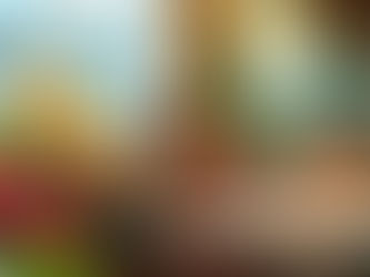 Teens sitting at a bright fast-food restaurant pauses to observe other teens talking and laughing, illustrating how kids learn to read social cues and group energy.