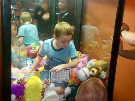 Local News Boy, 13, Gets Stuck Climbing into Claw Machine for Prize