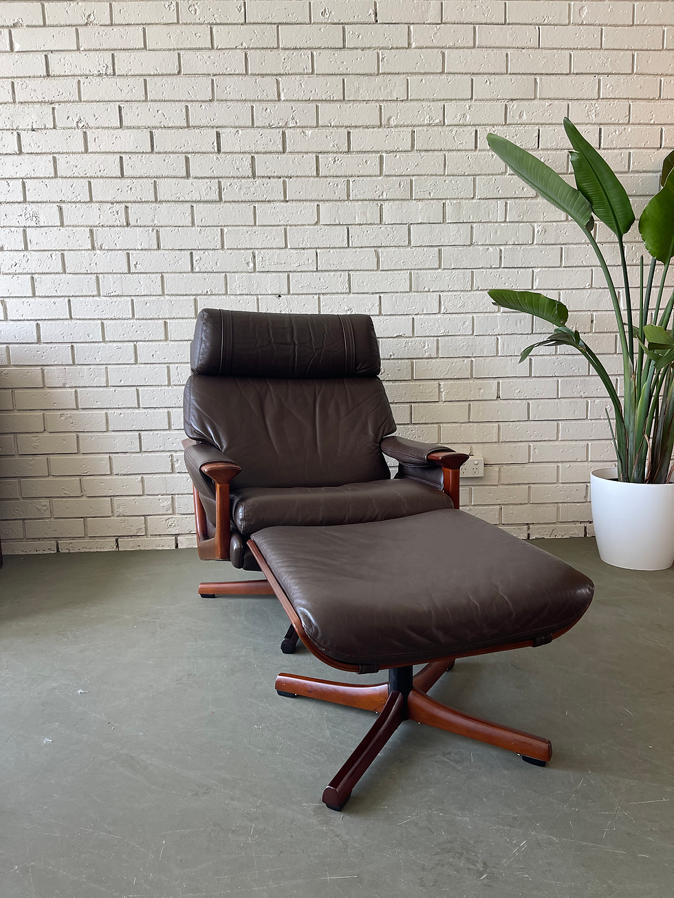 Thumbnail: Tessa T21 armchair and pedestal footstool