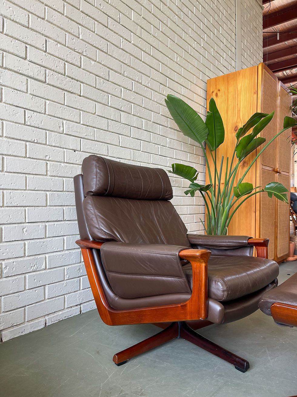 Thumbnail: Tessa T21 armchair and pedestal footstool