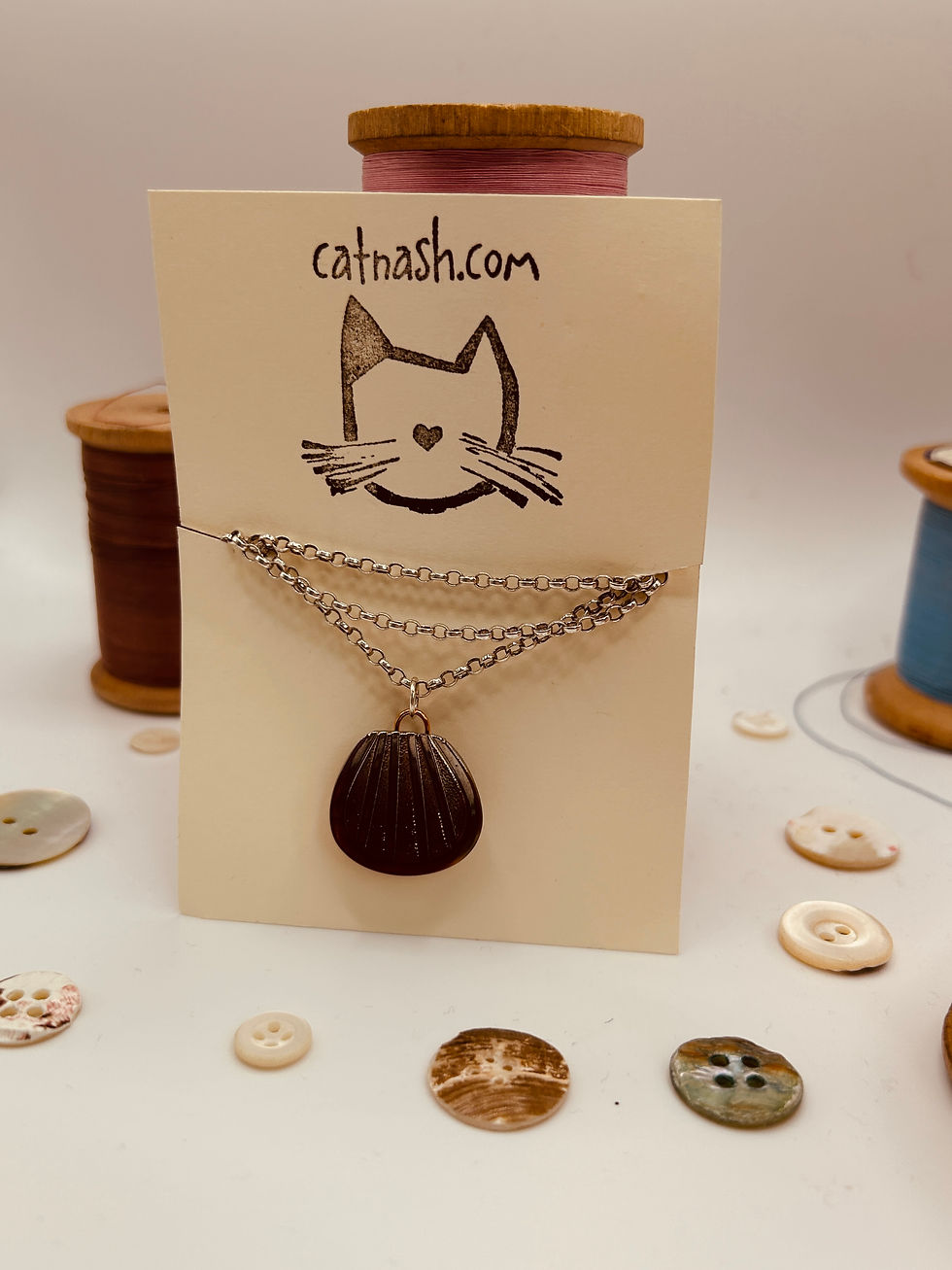 Sea shell shaped button necklace