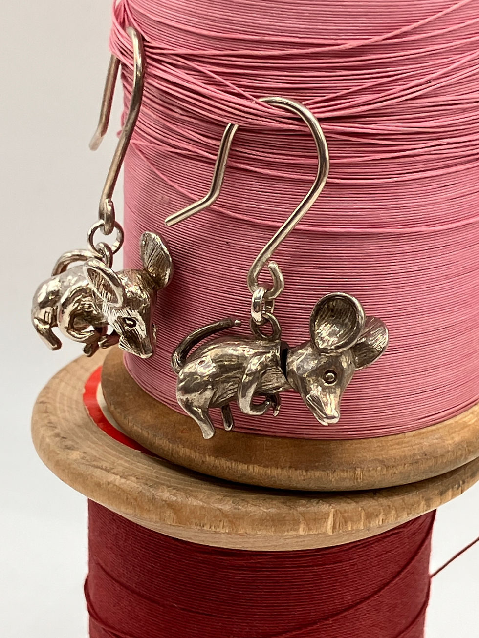 sterling Silver mice with articulated heads hung on sterling silver ear wires