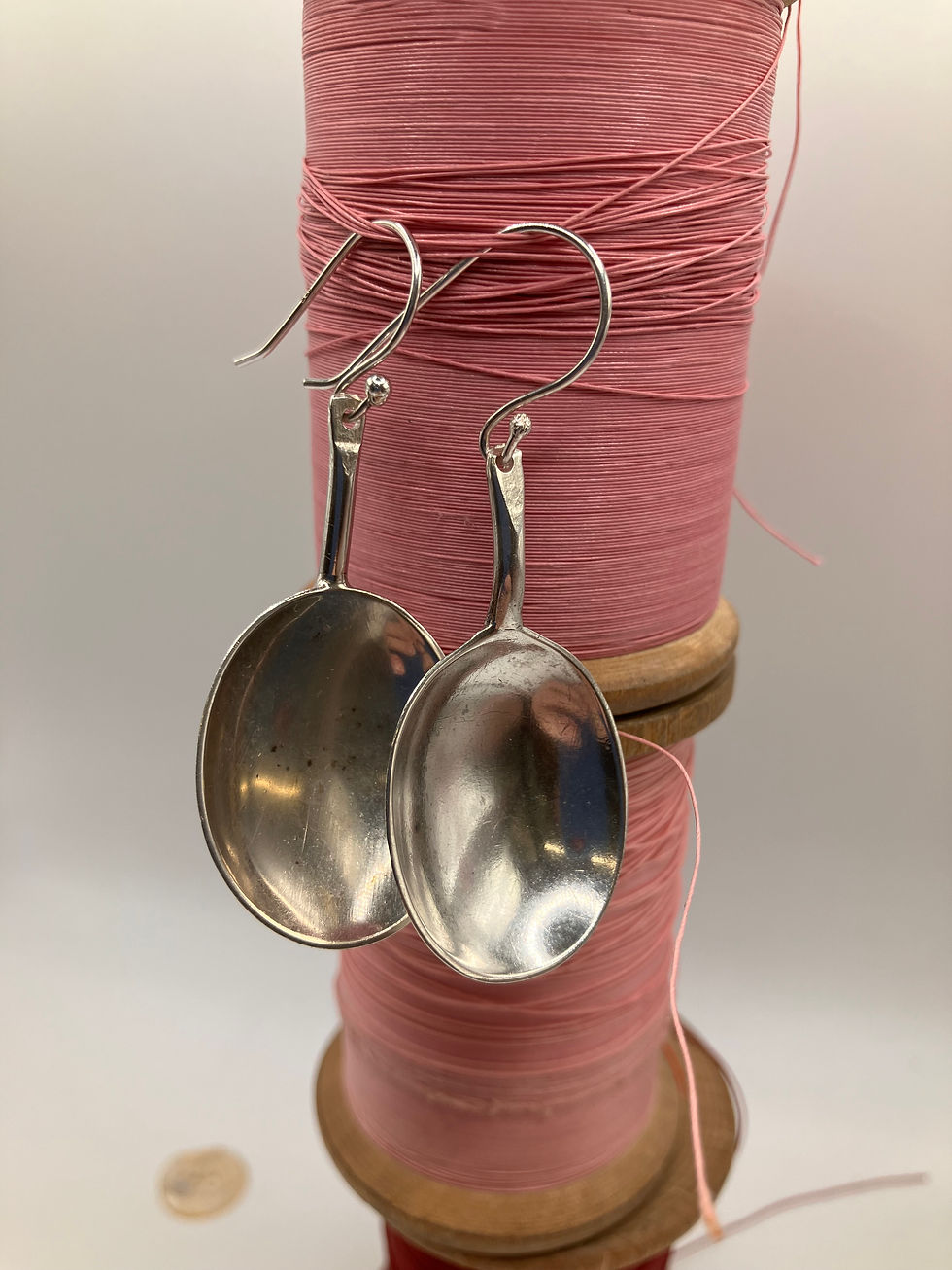 Silver earrings front view