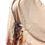 Thumbnail: front side view of Silk jacket on mannequin  with bow tie closure
