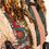 Thumbnail: front chest view showing patchwork colours creams green and red
