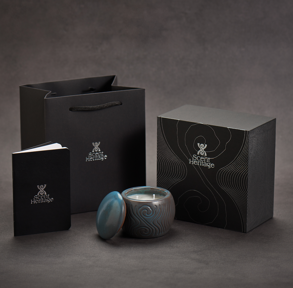a set of Scent Heritage Lotus Scented candles