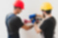handymen-installing-plug-with-level.jpg
