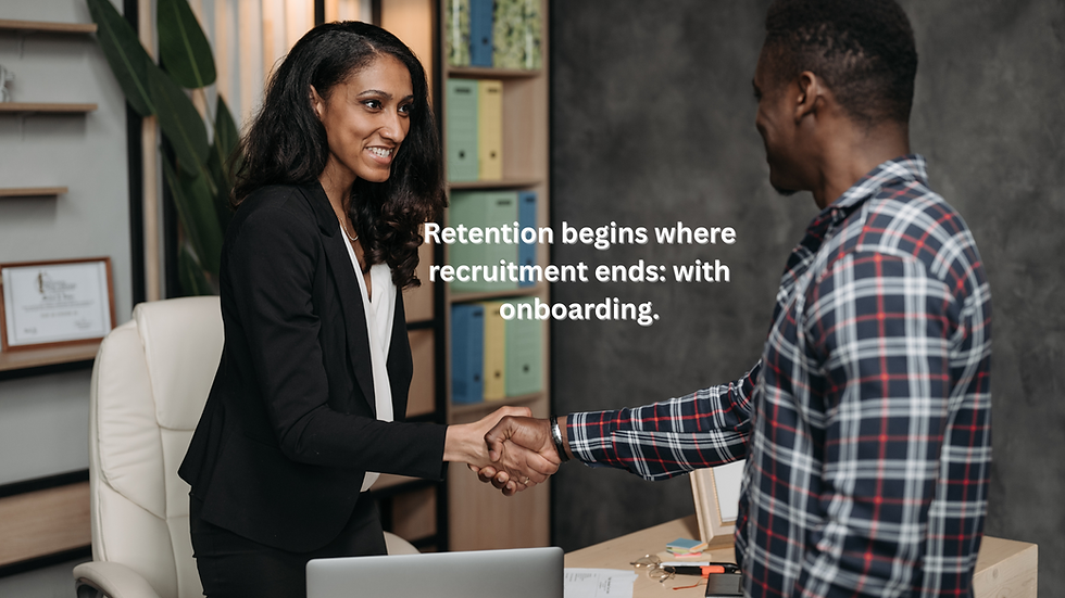 A manager welcome a new hire to the organizaton on their first day.