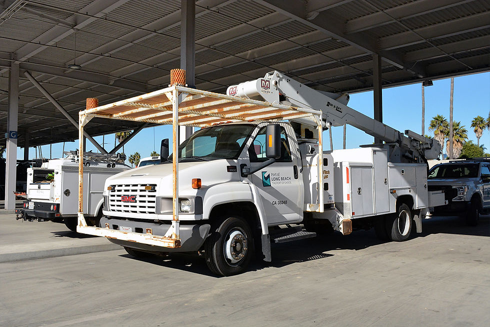 a medium duty fleet truck with a hydraulically-activated lift. 