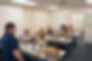 Image of an instructor teaching fleet technicians in a classroom.