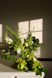 Fruit, flowers, bar arrangement, floral styling 