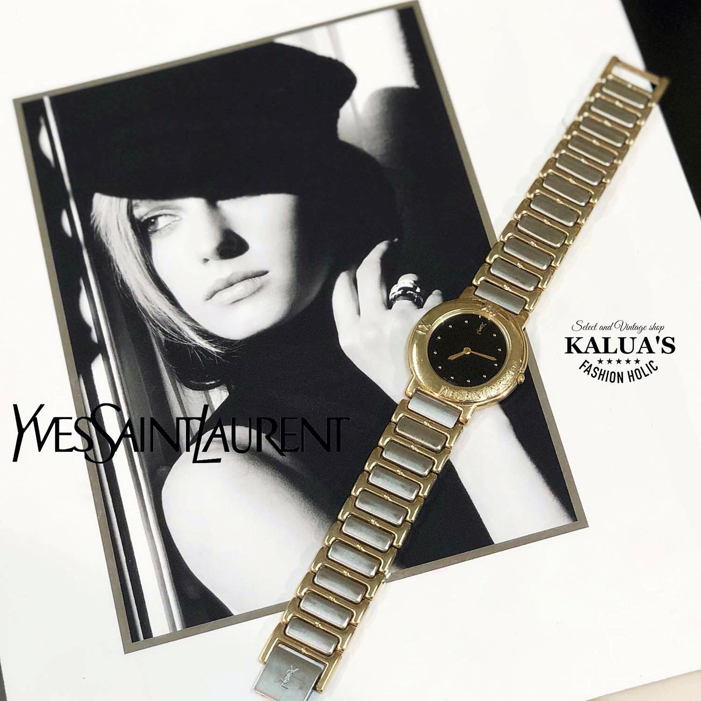 YVES SAINT LAURENT イヴ・サンローラン ラウンド ロゴ クォーツ