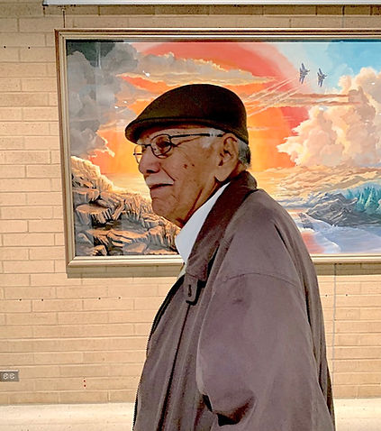 Dad Ramon in front of one of his painting, Dayton AF museum