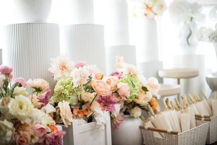 Wedding studio: pink flowers, white fans, hire items at The Wedding Stylist studio