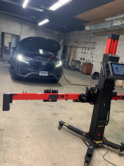 Image of a Honda being recalibrated using an autel IA700 calibration system