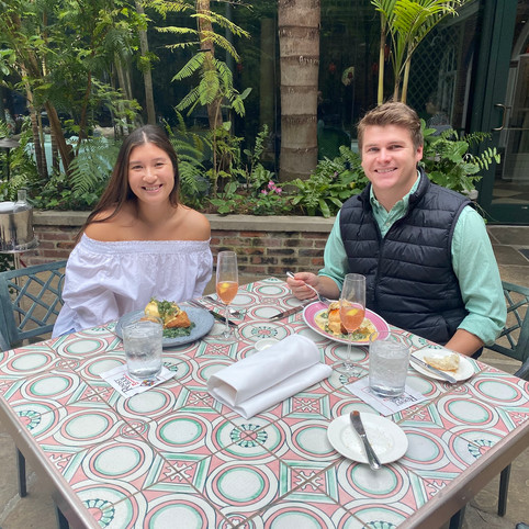 Maddy and Max enjoying brunch at Brennan's in New Orleans