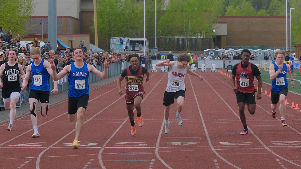 Sitka senior Calder Prussian (537) wins the Division II boys 100 meters in a personal best time of 11.19 during the Alaska School Activities Association Track and Field State Championships at Anchorage's Dimond High School on Saturday, May 30, 2026. All eight runners ran under 12 seconds. (Klas Stolpe / Juneau Independent)