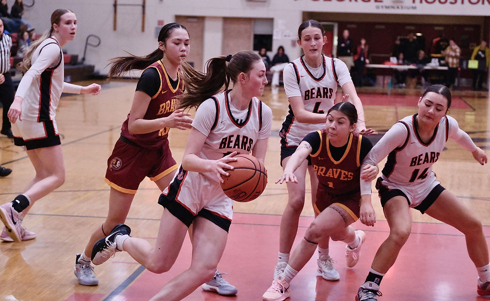 Juneau-Douglas senior Gwen Nizich starts a fast break among JDHS sophomore Athena Warr, left, Mt. Edgecumbe senior TAngela Ayuluk (13, Chevak), JDHS sophomore Sadie Lockhart (4), MEHS senior Lucy Capelle (1, Fairbanks), and JDHS junior Layla Tokuoka (14) during the Crimson Bears' 55-26 loss to the Lady Braves in the George Houston Gymnasium, Friday, Feb. 13, 2026. (Klas Stolpe / Juneau Independent)