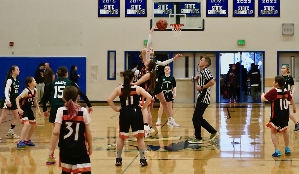 The Haines Lady Glacier Bears and Yakutat Lady Eagles tip off a game in the Thunder Mountain Middle School Icebreaker Basketball Tournament on Saturday. Action goes through Sunday at the TMMS gymnasium. (Klas Stolpe / Juneau Independent)