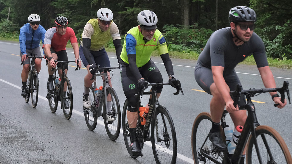 Juneau Freewheelers, left-to-right, Tom Faust, Liam Thier, Brandon Ivanowicz and Andrew Ferris ride the finale of the Tour of Juneau — the stage four End of the Road Race — on Sunday, Aug. 23, 2026. (Klas Stolpe / Juneau Independent)
