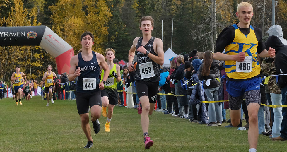 Juneau-Douglas High School: Yadaa.at Kalé senior Zacheriah Bos (463) sprints with Eagle River sophomore Mason Koontz (441), South Anchorage freshman Isaac Yager (525) and Kodiak junior Julian Kiefer (486) at the finish of the Division I boys Alaska State XC Championships at Anchorage's Bartlett High School trails on Saturday, Oct. 3, 2026. (Klas Stolpe / Juneau Independent)
