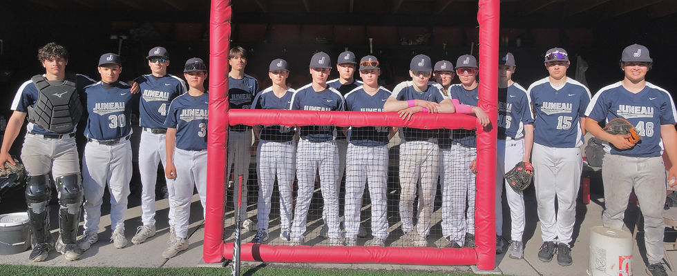 Juneau's Auke Bay Post 25 American Legion Baseball team pose before their season-opening game against West Post 1 at Adair-Kennedy Memorial Park field on Friday, June 12, 2026. (Klas Stolpe / Juneau Independent)
