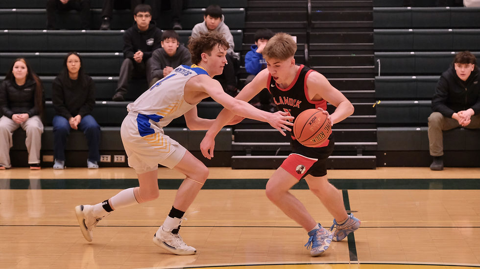Skagway senior Royce Borst (4) defends Klawock senior Connor Bagby (11) during their 7th place game at the 2026 ASAA March Madness Alaska State Basketball Championships on Saturday, March 14, 2026. (Klas Stolpe / Juneau Independent)
