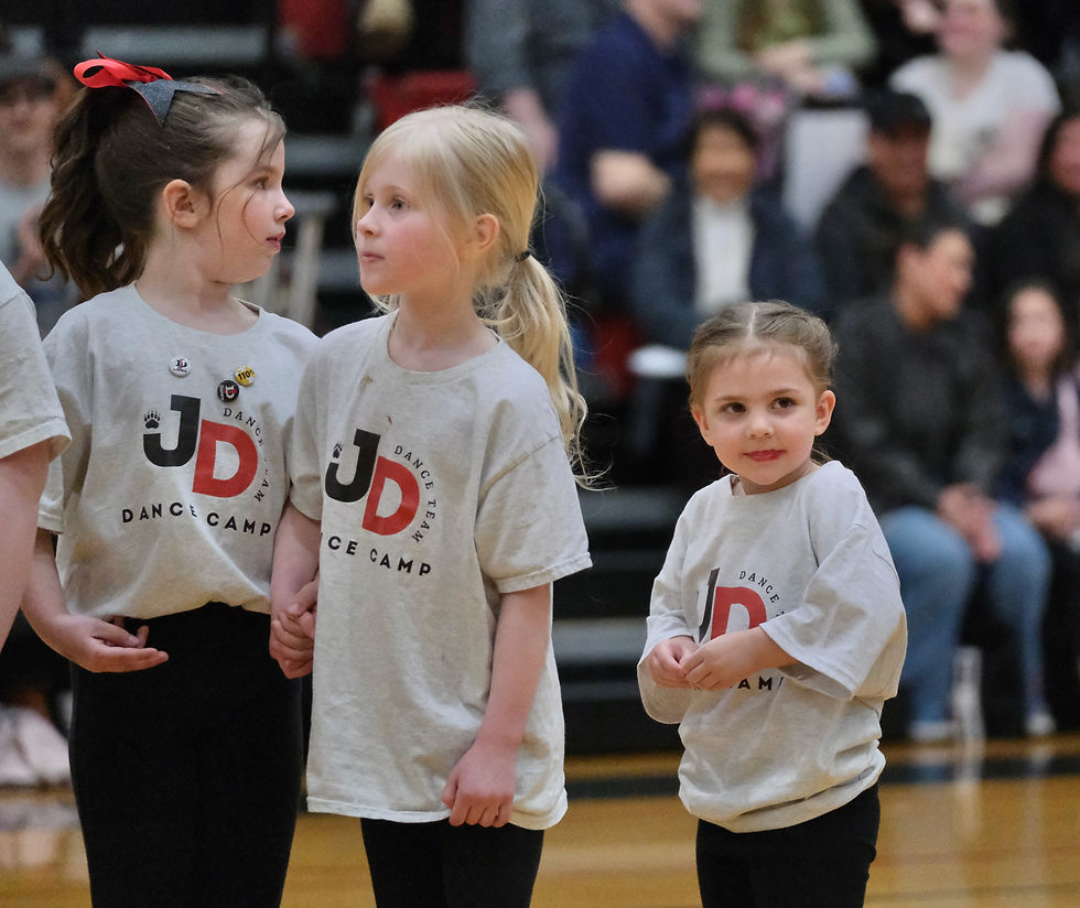 Young members attending the JDHS dance team's Dance Camp get ready to perform during Showtime 2026 on Saturday, April 4, in the Juneau-Douglas High School: Yadaa.at Kalé George Houston Gymnasium. (Klas Stolpe / Juneau Independent)