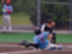 Auke Bay Post 25 catcher Nate Fick tags out East Post 34 runner Yeralvin Ramirez (7) at home plate during Alaska American Legion action at Adair-Kennedy Memorial Park on Friday, July 10, 2026. Auke Bay won 12-2. (Klas Stolpe / Juneau Independent)