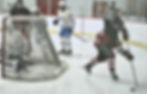In this file photo Juneau-Douglas High School: Yadaa.at Kalé senior Paxton Mertl (7) works behind the net against Palmer at Treadwell Arena this season. JDHS defeated Delta Junction on the road 11-1 on Friday, Jan. 16, 2026. (Klas Stolpe / Juneau Independent)