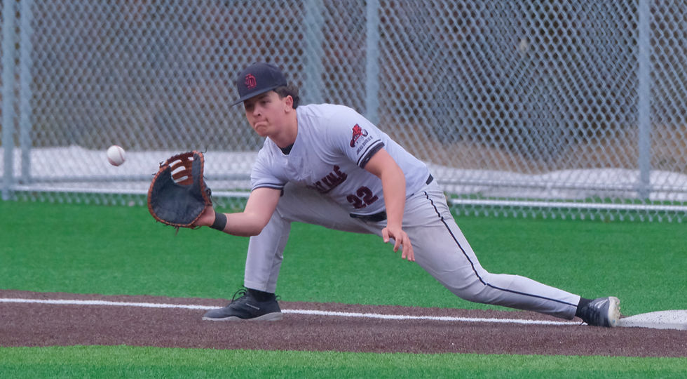 Juneau-Douglas High School: Yadaa.at Kalé senior Riley Fick catches a putout throw against Ketchikan at Adair Kennedy Memorial Park on Wednesday, May 6, 2026. (Klas Stolpe / Juneau Independent)