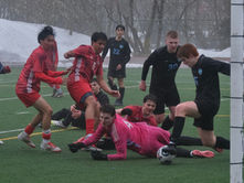 Freshmen pair’s first varsity goals carry Crimson Bears past Mustangs