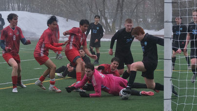 Freshmen pair’s first varsity goals carry Crimson Bears past Mustangs