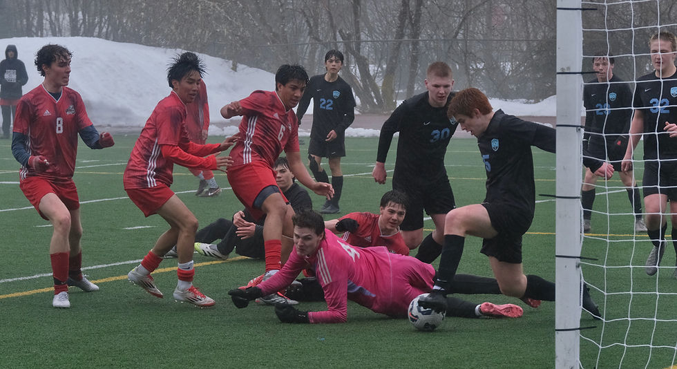 Freshmen pair’s first varsity goals carry Crimson Bears past Mustangs