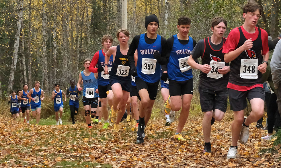 Sitka sophomores Owen Mork (393) and Silas Marley (392) race during the Division II boys Alaska State XC Championships at Anchorage's Bartlett High School trails on Saturday, Oct. 3, 2026. (Klas Stolpe / Juneau Independent)