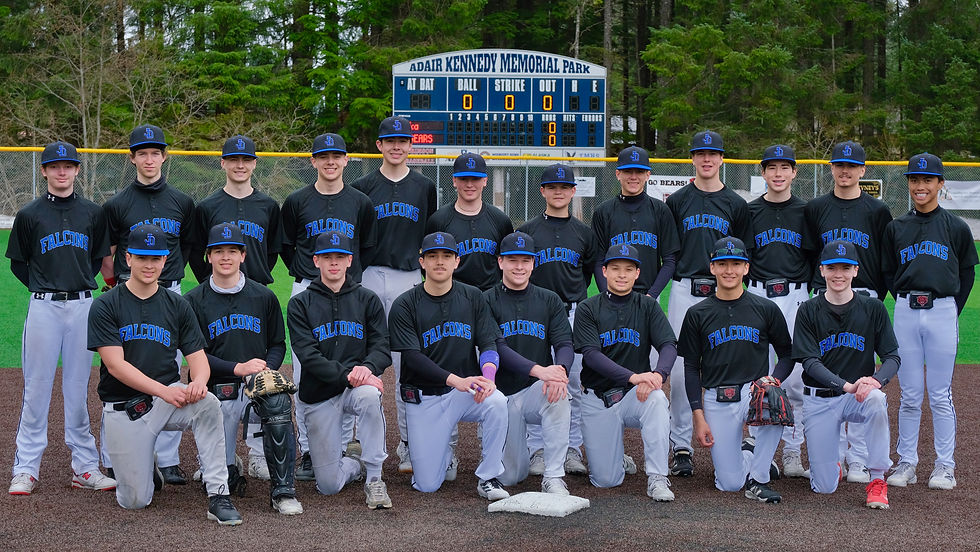 The Juneau-Douglas High School: Yadaa.at Kalé Crimson Bears honored their graduating seniors by wearing the colors of four graduates who began their baseball journey with the now-defunct Thunder Mountain High School Falcons during senior celebrations at Adair-Kennedy Memorial Park on Saturday, May 9, 2026. Kneeling in front are senior Riley Fick, Nathan Fick, Ryland Carlson, Christopher Andersen, Marcus Mendoza, Madden Mendoza, Tyler Kookesh and Cayman Huff. (Klas Stolpe / Juneau Independent)