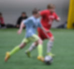 Frosty Futbolers (blue) vs. St. Nick's Hat Tricks (red) on Tuesday, Dec. 23, 2025. (Klas Stolpe / Juneau Independent)