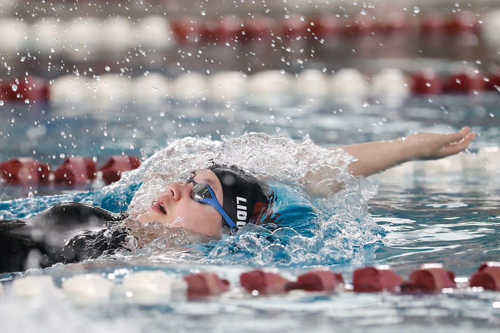 Juneau-Douglas High School: Yadaa.at Kalé's Amy Liddle does the backstroke, winning the women's 100-yard backstroke during the Kayhi Swim Meet at the Gateway Aquatic Center on Saturday, Sep. 19. (Photo by Christopher Mullen/ Ketchikan Daily News)
