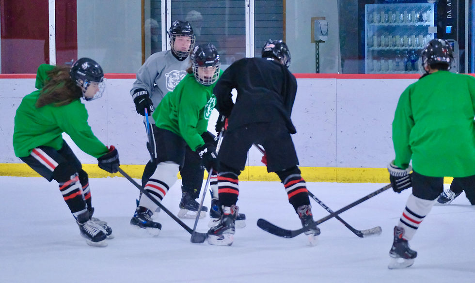 The Juneau-Douglas High School: Yadaa.at Kalé hockey team work a drill in practice at the Treadwell Arena on Monday, Feb. 2, 2026. The Crimson Bears open Division II state tournament play at 1:30 p.m. Thursday against Soldotna at Palmer's MTA Events Center. (Klas Stolpe / Juneau Independent)