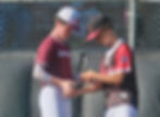 Ketchikan Junior All-Star Rylan Jones and Gastineau Channel Little League Junior All-Star Max Hayes exchange pins during game one of the best-of-five series in the 2026 Alaska Junior Baseball State Tournament at Adair-Kennedy Memorial Park field on Thursday, July 16, 2026. Ketchikan won 15-5. (Klas Stolpe / Juneau Independent)