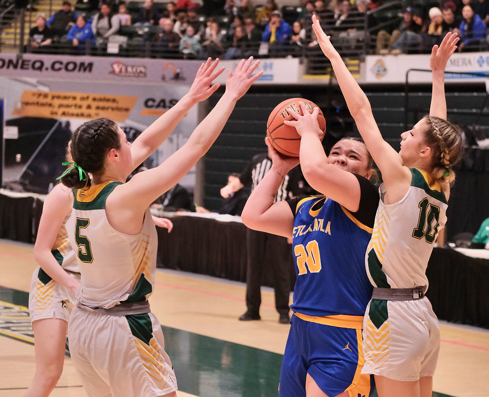 Seward Seahawks junior Lia Shank (5) and senior Ava Jagielski (10 defend Metlakatla senior Morgan Hayward (20) during their semifinal game at the 2026 ASAA March Madness Alaska State Basketball Championships on Friday, March 13, 2026. (Klas Stolpe / Juneau Independent)