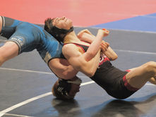 Photo gallery: Alaska’s top high school wrestlers post high numbers during state title matches