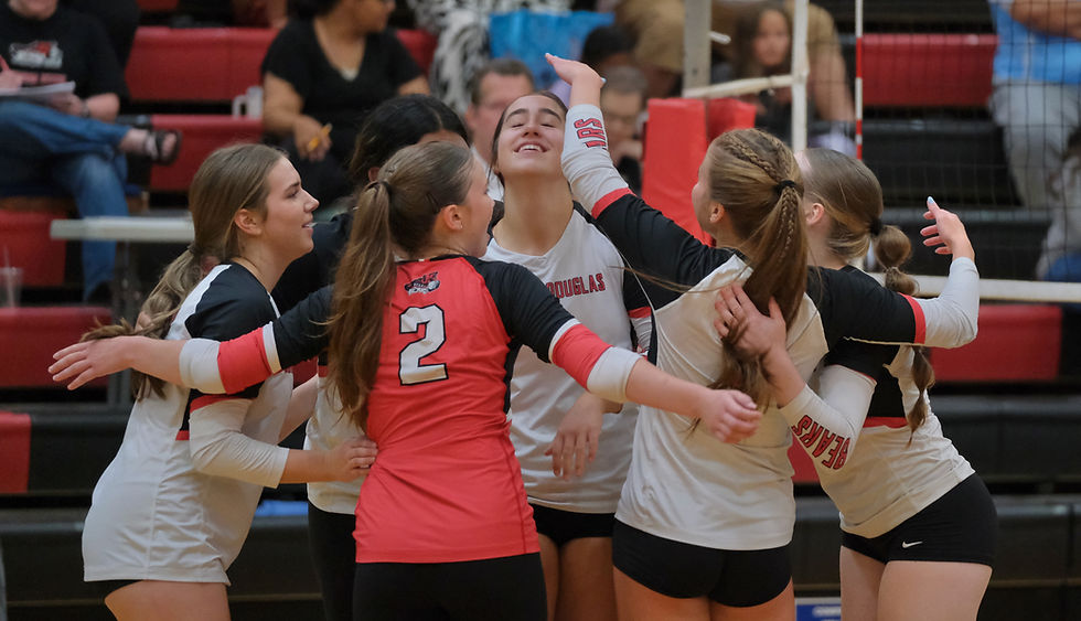 The Juneau-Douglas High School: Yadaa.at Kalé Crimson Bears celebrate a score by senior Ruby Koski during their 3-2 (25-23, 22-25, 25-14, 21-25, 15-12) match loss to the Sitka Wolves at the George Houston Gymnasium on Saturday, Aug. 22, 2026. (Klas Stolpe / Juneau Independent)