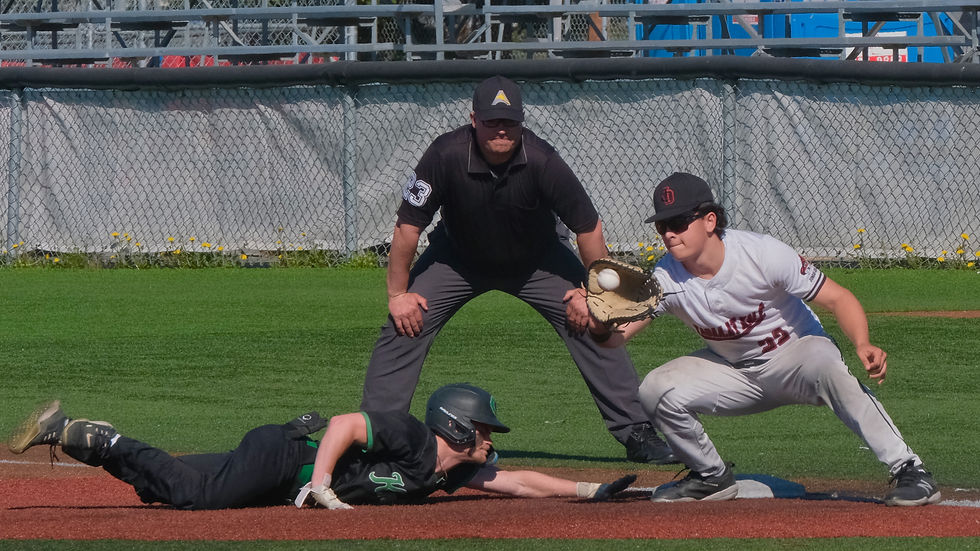 Juneau-Douglas High School: Yadaa.at Kalé senior first baseman Riley Fick (22) takes a tag attempt throw on Colony sophomore Chase Carlson during the Crimson Bears' 8-3 win over the Knights in the opening game of the ASAA DI Baseball State Championships at Anchorage's Mulchay Stadium on Thursday, June 4, 2026. (Klas Stolpe / Juneau Independent)