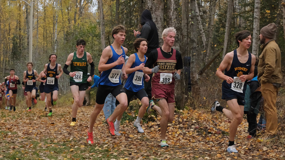 Sitka senior Derek Wilson (398) runs with Seward junior Luke Elhard (384), Nome-Beltz senior Granite Peacock (377), Grace Christian senior Grant Eldridge (308) and Homer sophomore Yuki Bacher (320) during the Division II boys Alaska State XC Championships at Anchorage's Bartlett High School trails on Saturday, Oct. 3, 2026. (Klas Stolpe / Juneau Independent)