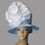 Thumbnail: Baby Blue Satin Lamp Shade Hat with Large White Flower Bow Accent