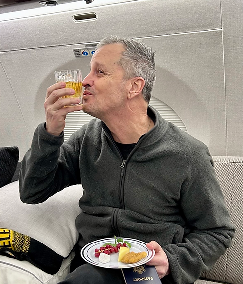 real time photo of Marc on the plane.png